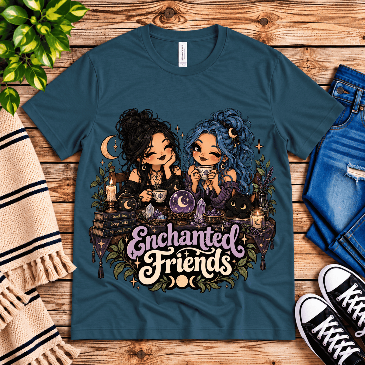 Enchanted Friends cute celestial graphic t-shirt cozy flat lay in deep teal.