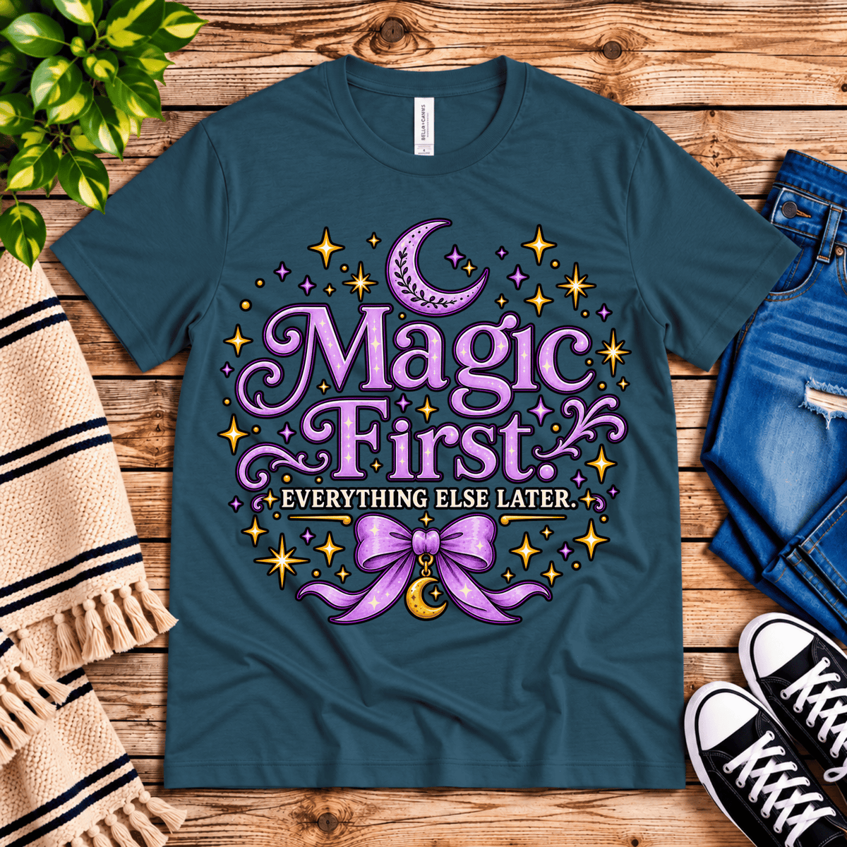 Magic First cute celestial graphic t-shirt cozy flat lay in deep teal.
