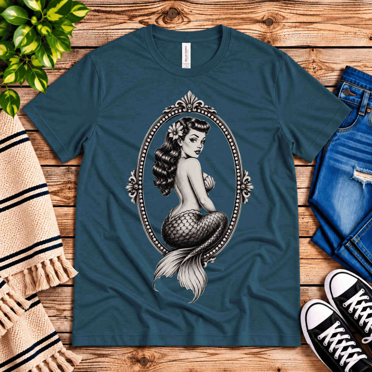 Mermaid Cameo vintage pinup graphic t-shirt cozy flat lay in deep teal.