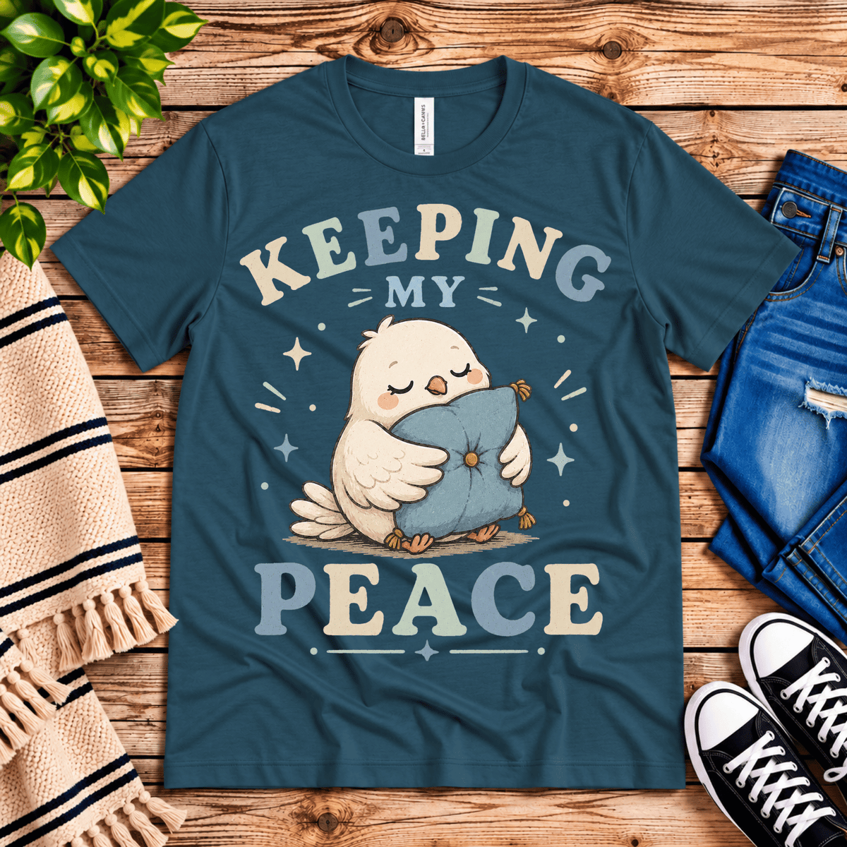 Keeping My Peace cute animal graphic t-shirt cozy flat lay in deep teal.