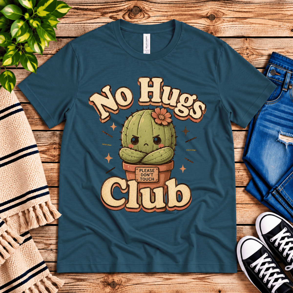 No Hugs Club funny cactus graphic t-shirt cozy flat lay in deep teal.