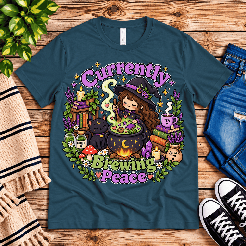 Currently Brewing cute witchy graphic t-shirt cozy flat lay in deep teal.