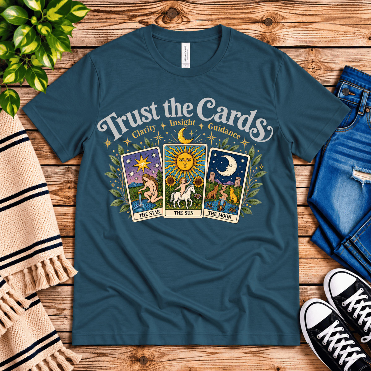 Trust the Cards mystical tarot graphic t-shirt cozy flat lay in deep teal.