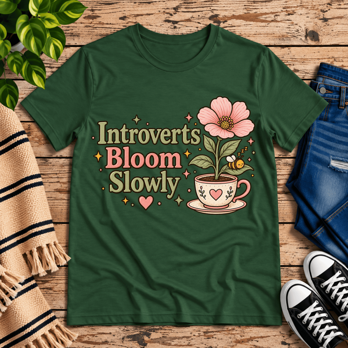 Introverts Bloom Slowly cute plant graphic t-shirt cozy flat lay in evergreen.