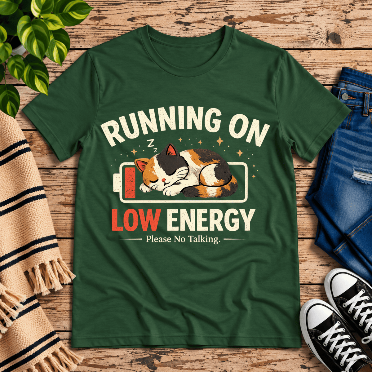 Low Energy Cat cute animal graphic t-shirt cozy flat lay in evergreen.