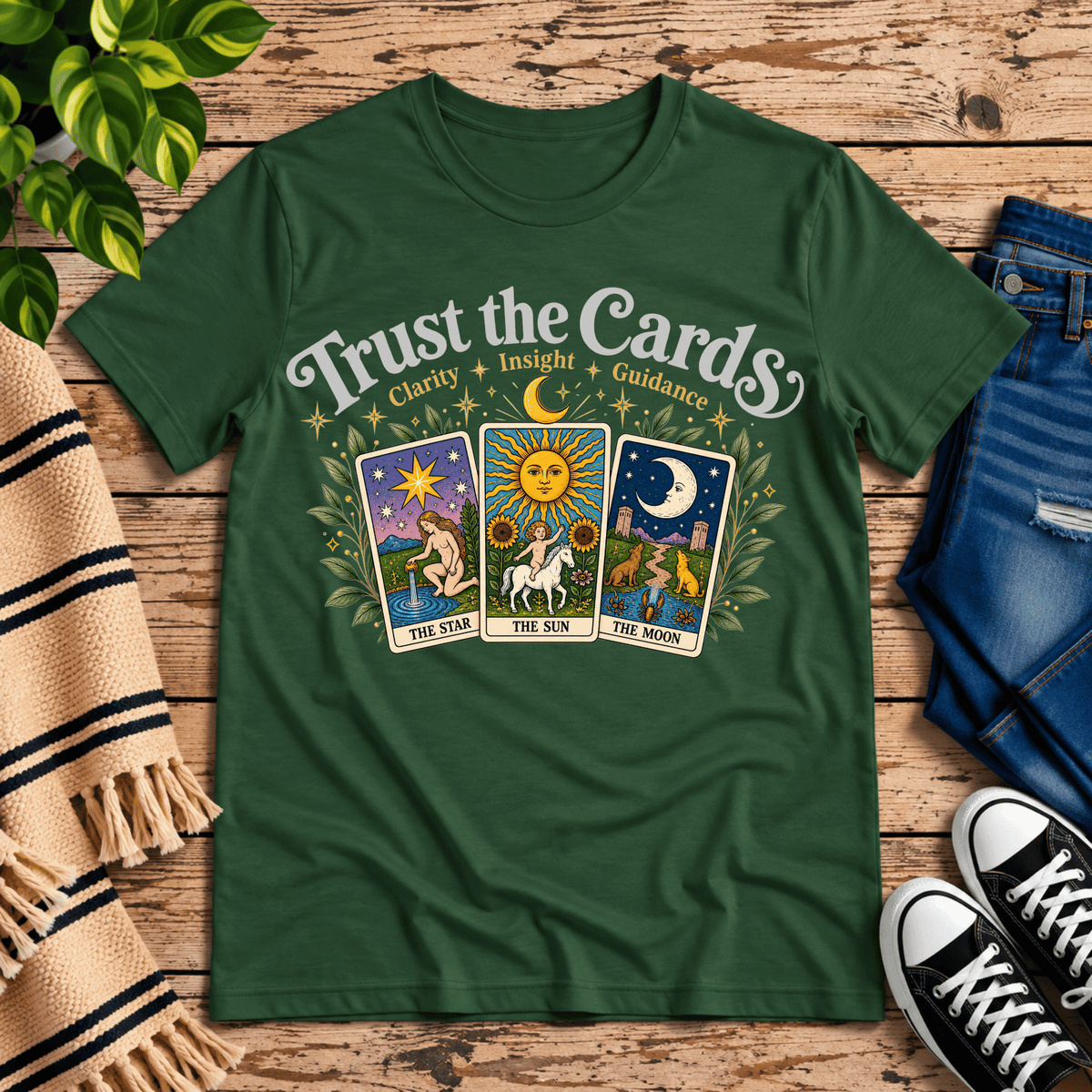 Trust the Cards mystical tarot graphic t-shirt cozy flat lay in evergreen.