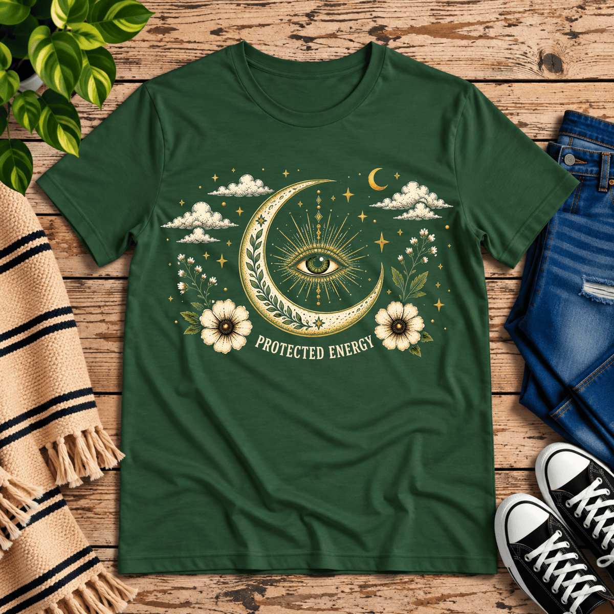 Protected Energy celestial mystic graphic t-shirt cozy flat lay in evergreen.
