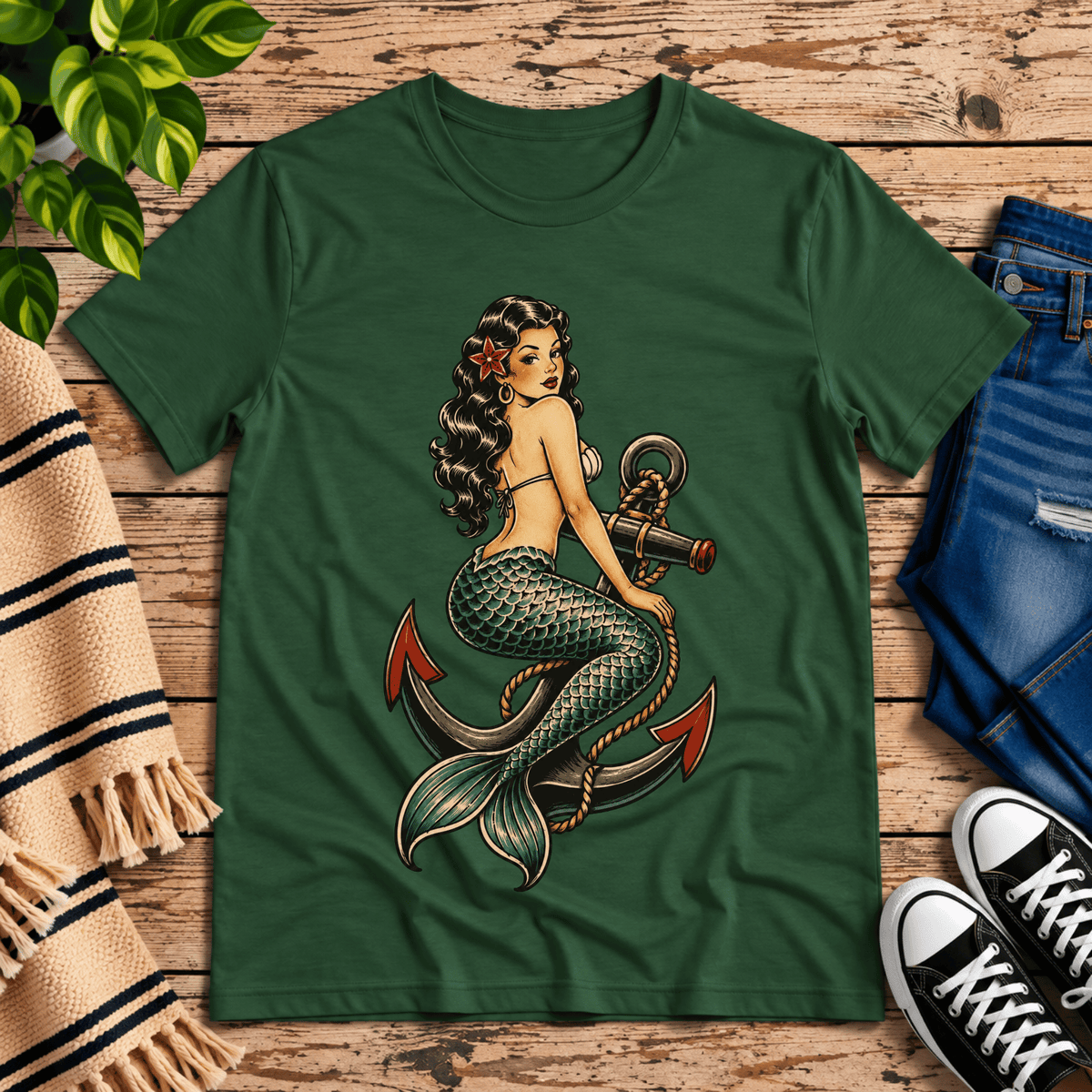 Anchor Mermaid vintage pinup graphic t-shirt cozy flat lay in evergreen.