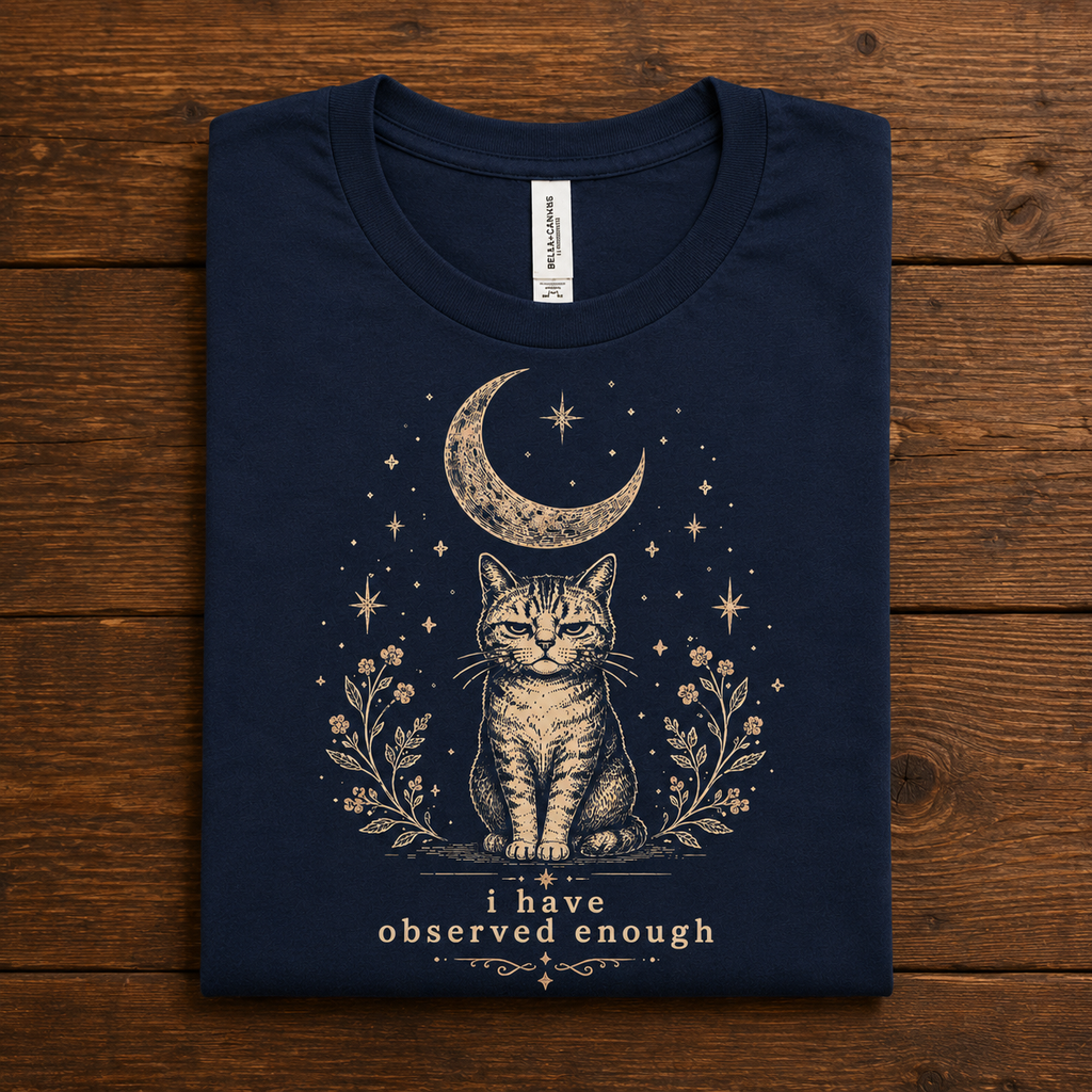 A folded mockup of I have Observed enough cute animal graphic t-shirt in navy.