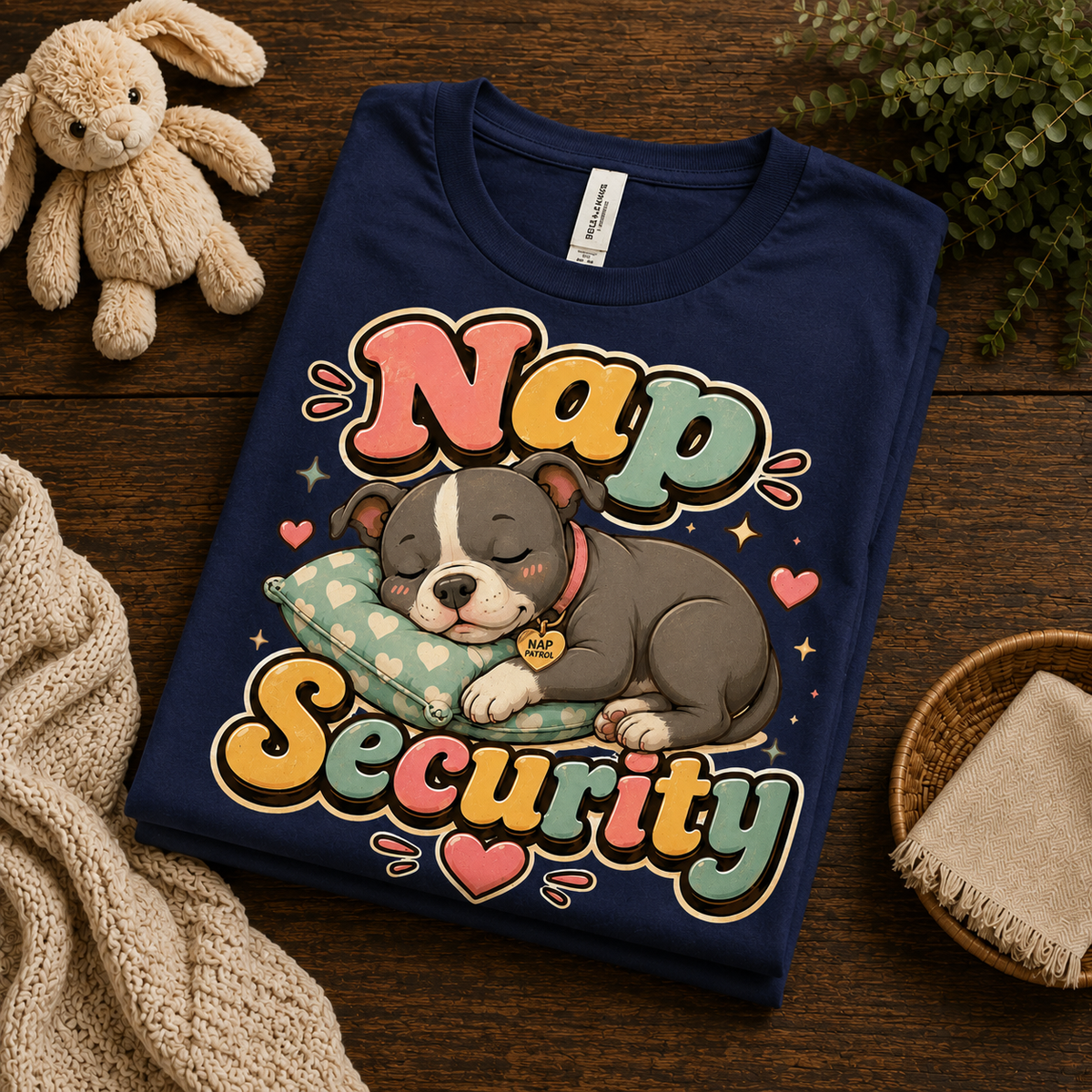 A folded mockup of Nap Security cute animal graphic t-shirt in navy.