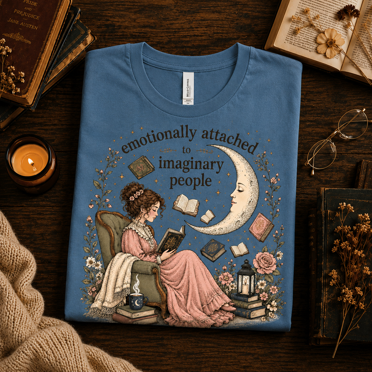 A folded mockup of Imaginary People cute book graphic t-shirt in steel blue.