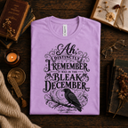 A folded mockup of Bleak December book quote graphic t-shirt in lilac.