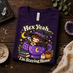 A folded mockup of Hex Yeah cute witchy graphic t-shirt in team purple.