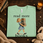 A folded mockup of Read More vintage book graphic t-shirt in mint.