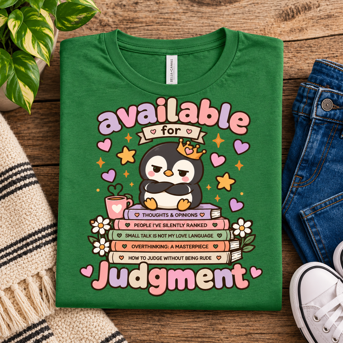 A folded mockup of Available for Judgement cute animal graphic t-shirt in leaf.