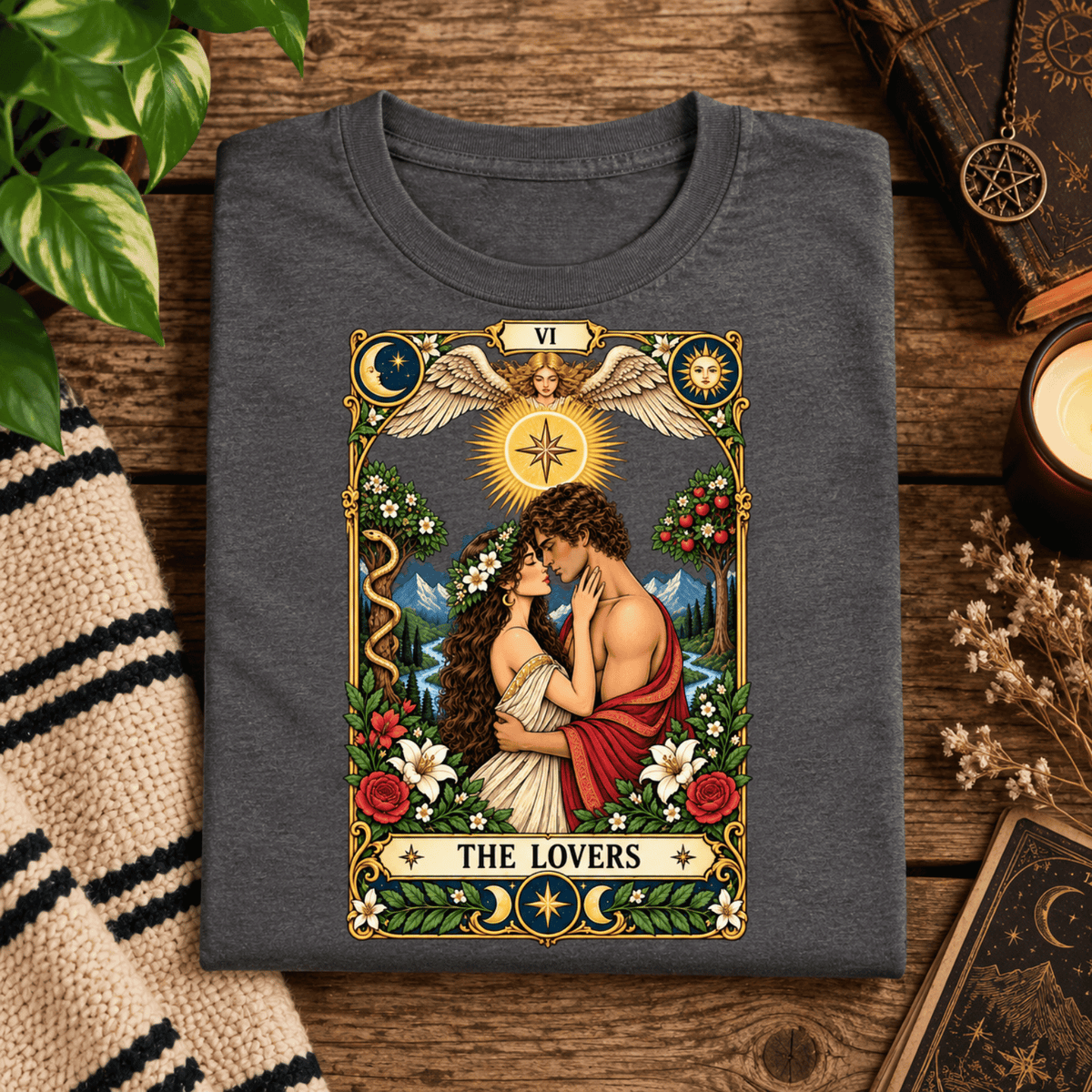 A folded mockup of The Lovers tarot card mystical graphic t-shirt in asphalt.