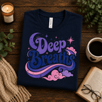 A folded mockup of Deep Breaths inspirational introvert graphic t-shirt in navy.