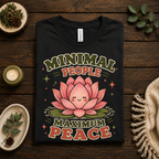A folded mockup of Minimal People cute plant graphic t-shirt in vintage black.