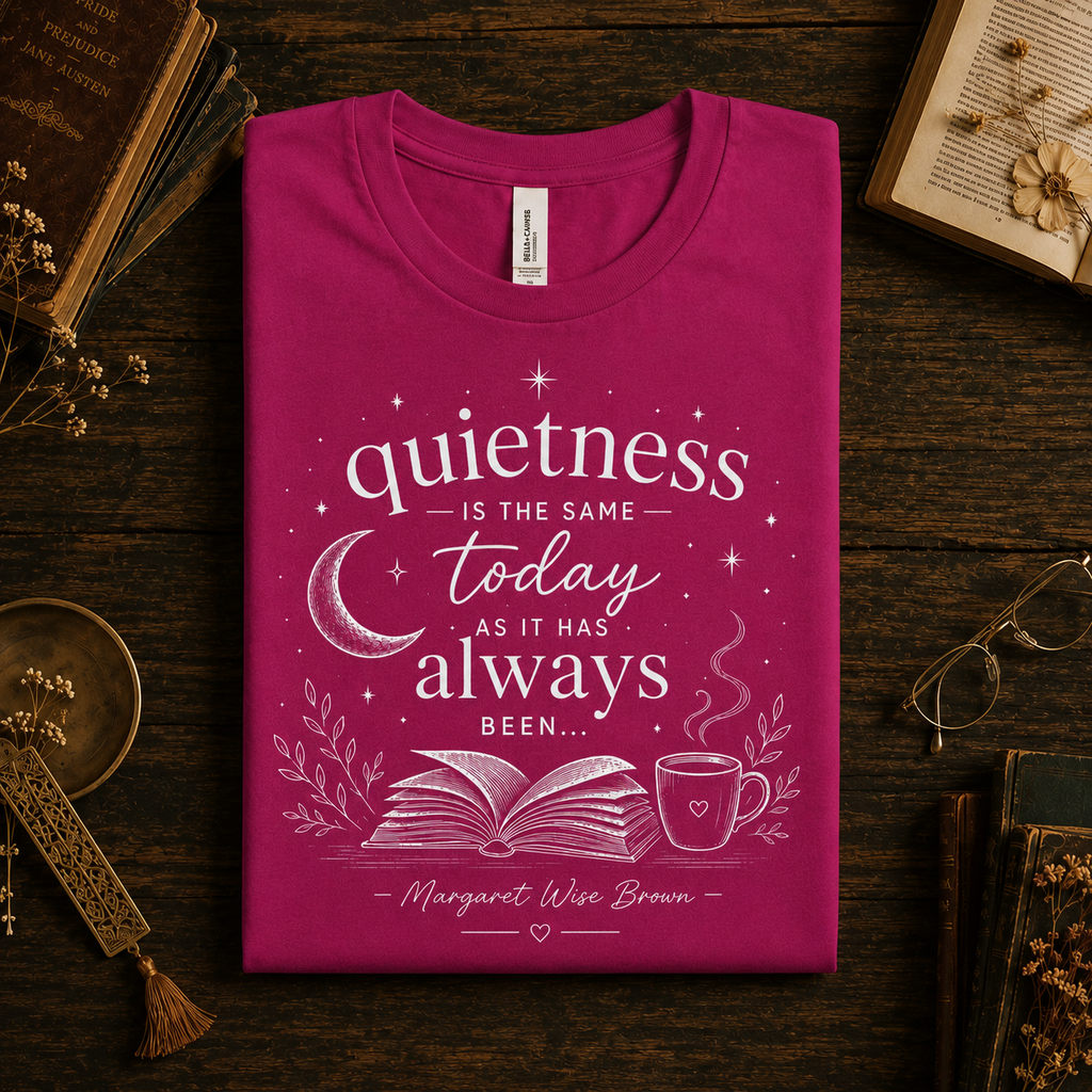 A folded mockup of Quietness Today book quote graphic t-shirt in berry.
