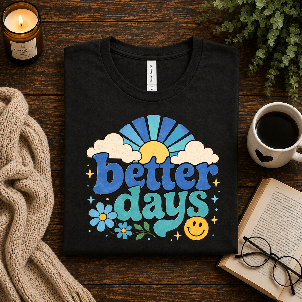 A folded mockup of Better Days inspirational introvert graphic t-shirt in vintage black.
