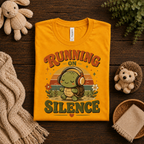 A folded mockup of Running On Silence cute animal graphic t-shirt in gold.