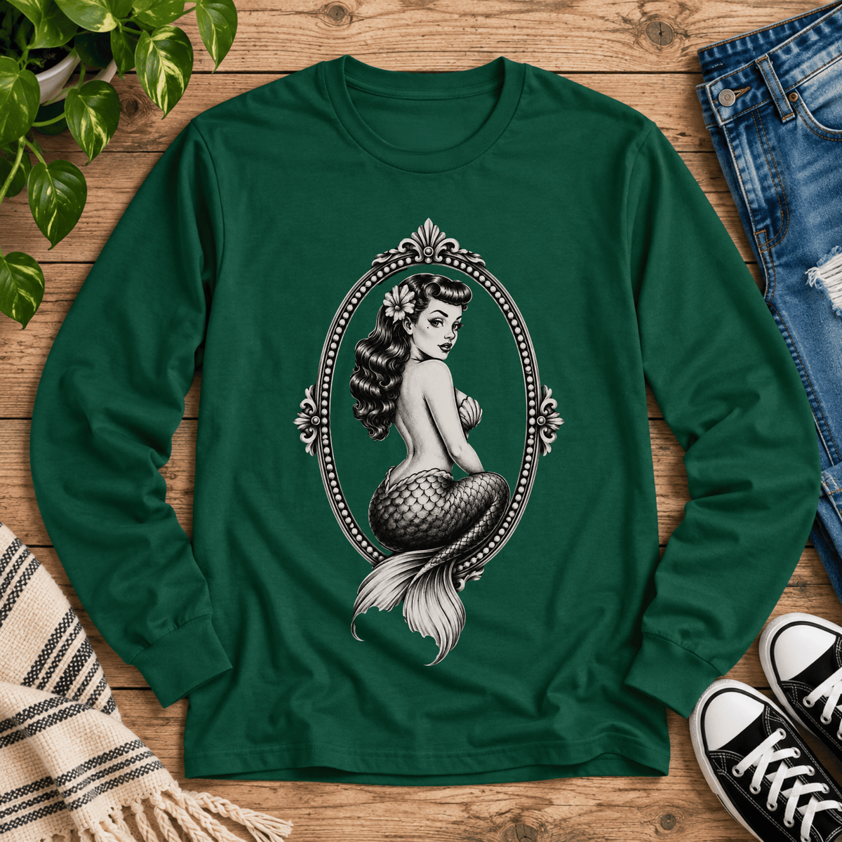 Mermaid Cameo vintage pinup graphic long sleeve t-shirt cozy flat lay in forest green.