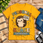 Personal Space Enthusiast cute animal graphic t-shirt cozy flat lay in gold.