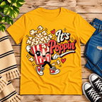 It's Poppin' cute food graphic t-shirt cozy flat lay in gold.