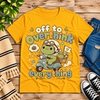 Overthink Frog cute animal graphic t-shirt cozy flat lay in gold.