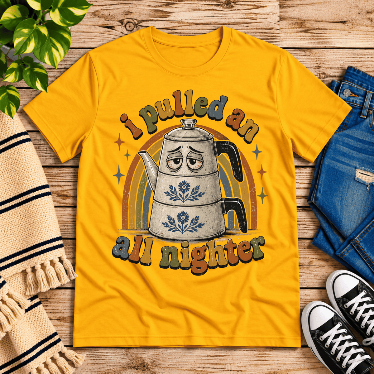 All Nighter cute coffee graphic t-shirt cozy flat lay in gold.