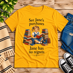 See Jane's Purchases vintage book graphic t-shirt cozy flat lay in gold.