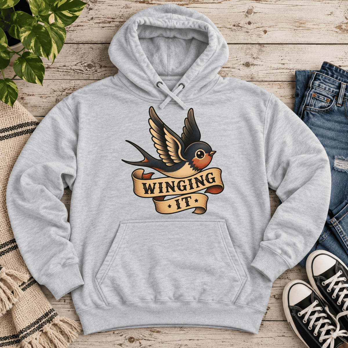 Winging It cute animal graphic hoodie cozy flat lay in heather grey.