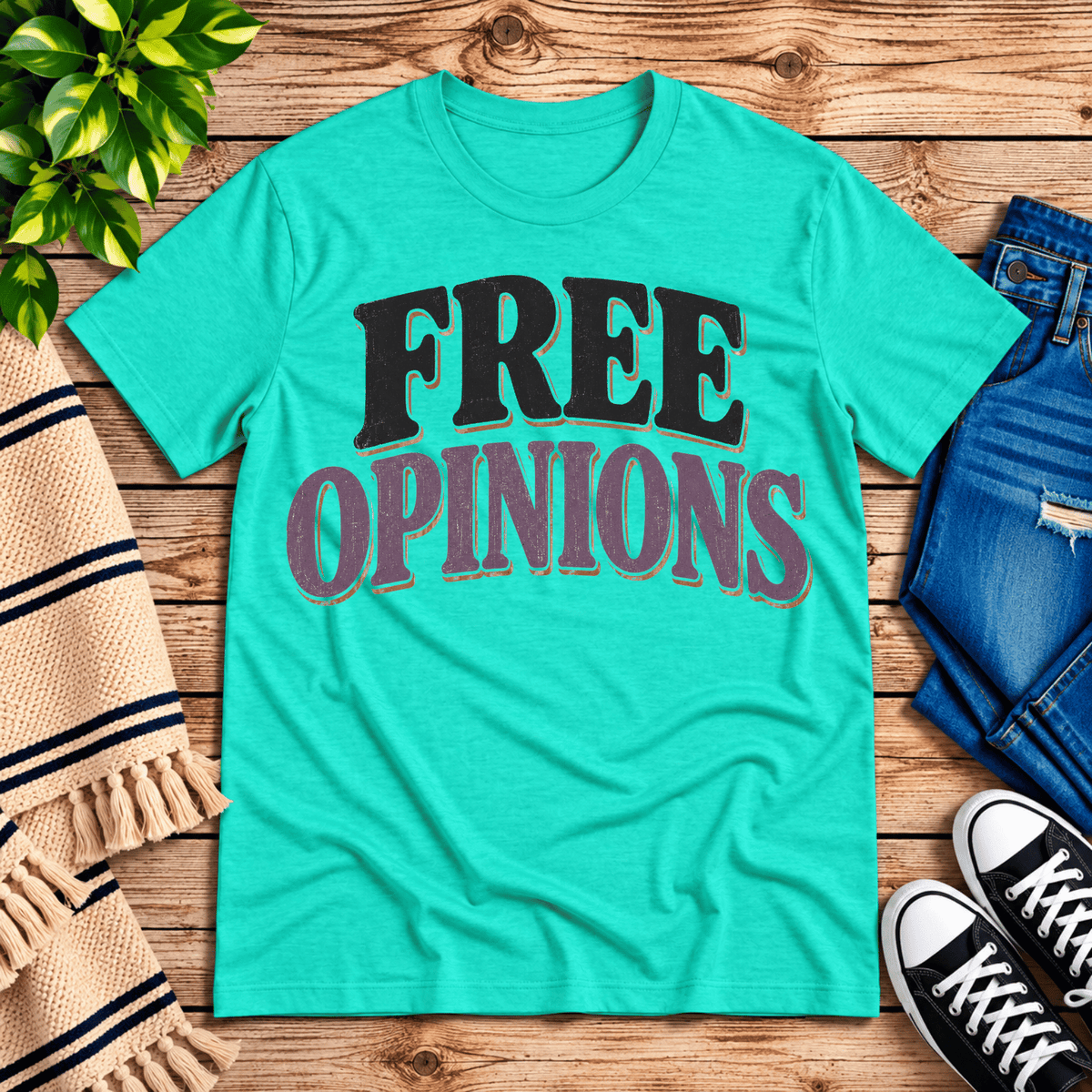 Free Opinions funny introvert graphic t-shirt cozy flat lay in heather sea green.