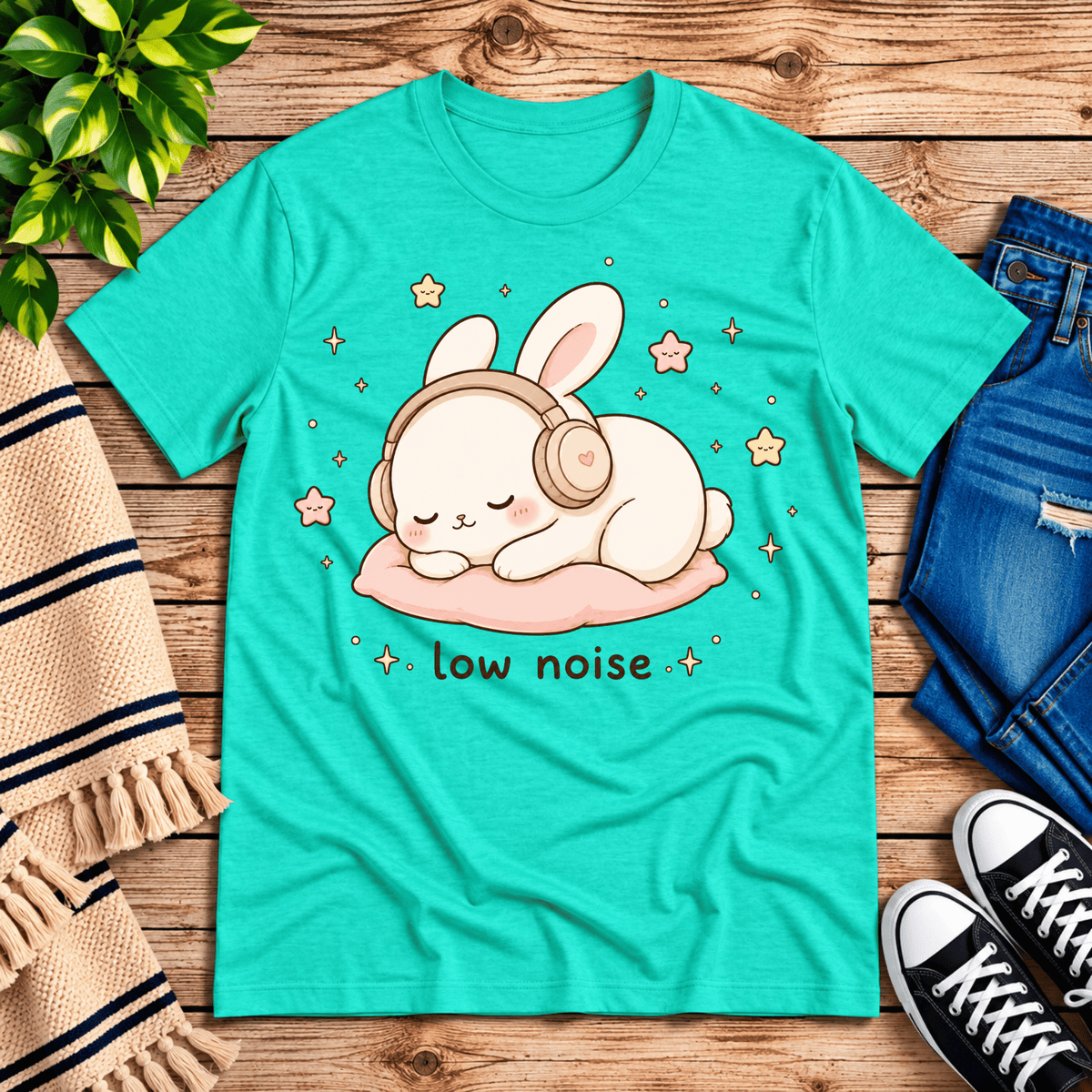 Low Noise Bunny cute animal graphic t-shirt cozy flat lay in heather sea green.