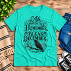 Bleak December book quote graphic t-shirt cozy flat lay in heather sea green.