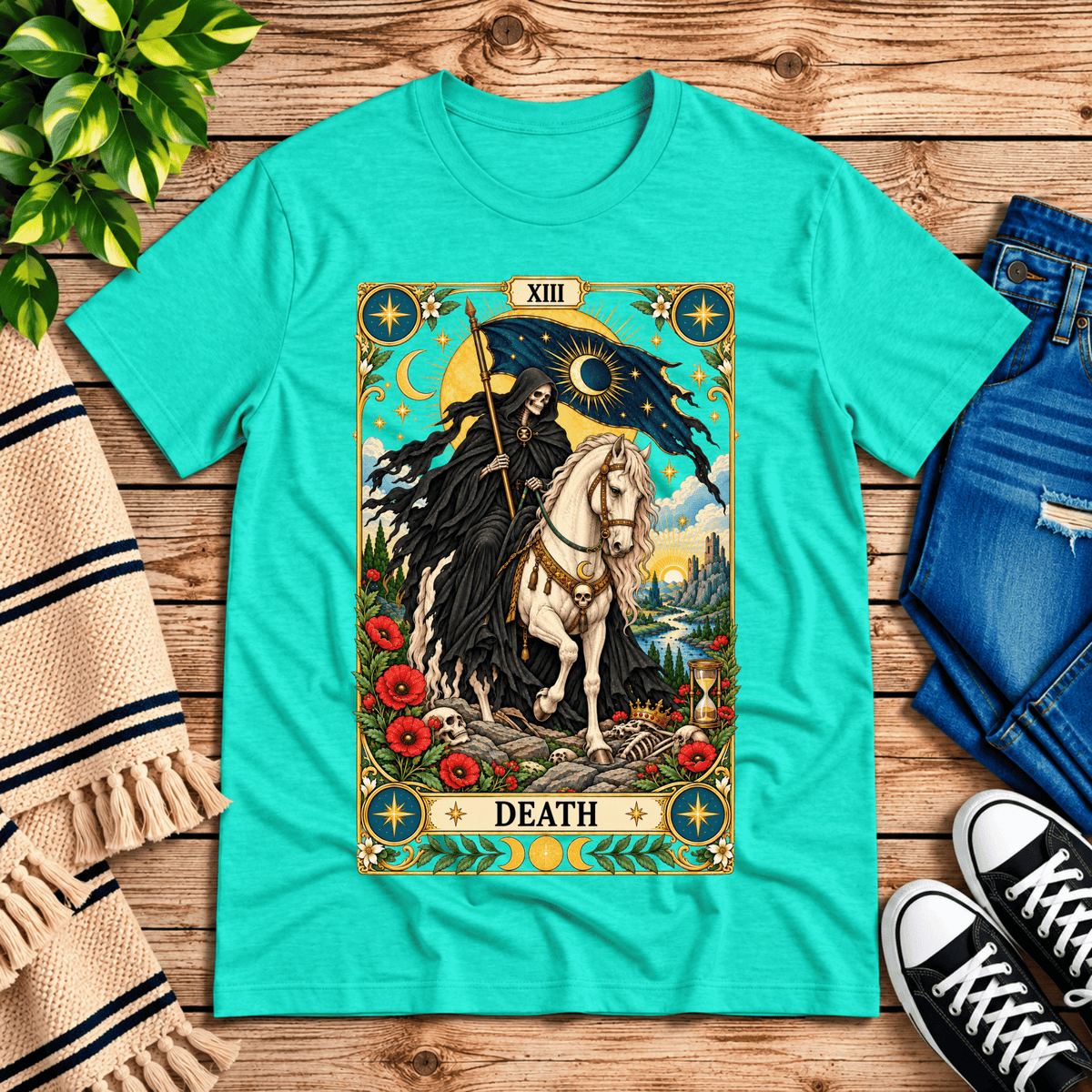 Death tarot card graphic t-shirt cozy flat lay in heather sea green.