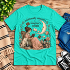 Imaginary People cute book graphic t-shirt cozy flat lay in heather sea green.