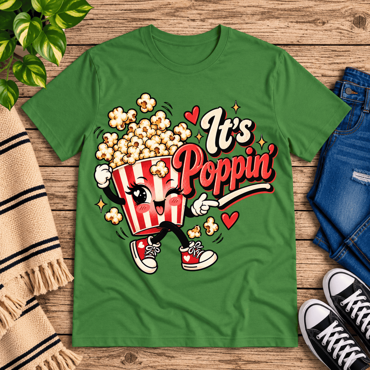 It's Poppin' cute food graphic t-shirt cozy flat lay in leaf.