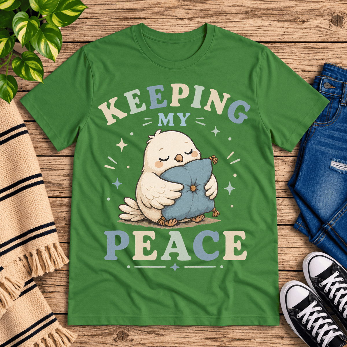 Keeping My Peace cute animal graphic t-shirt cozy flat lay in leaf.