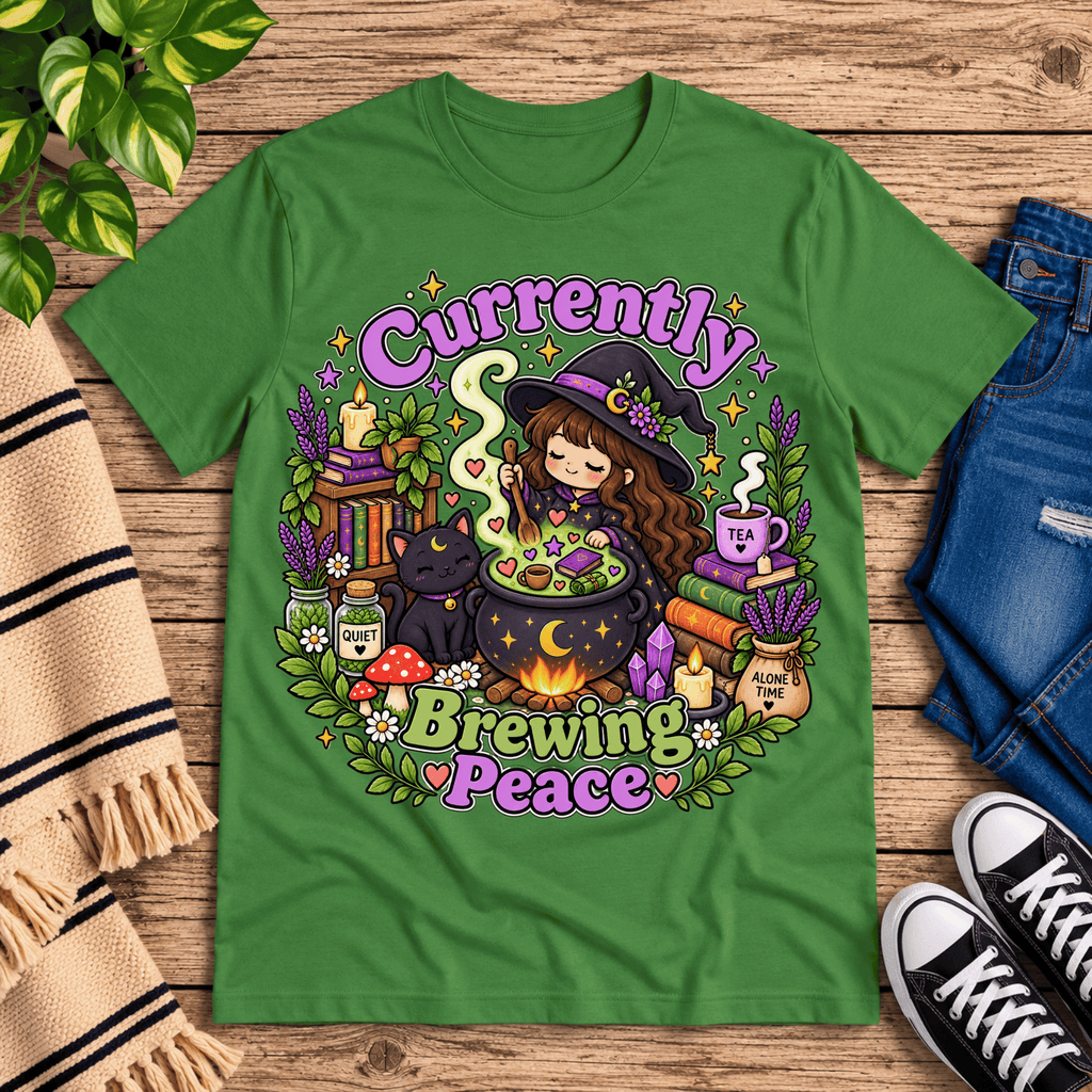 Currently Brewing cute witchy graphic t-shirt cozy flat lay in leaf.