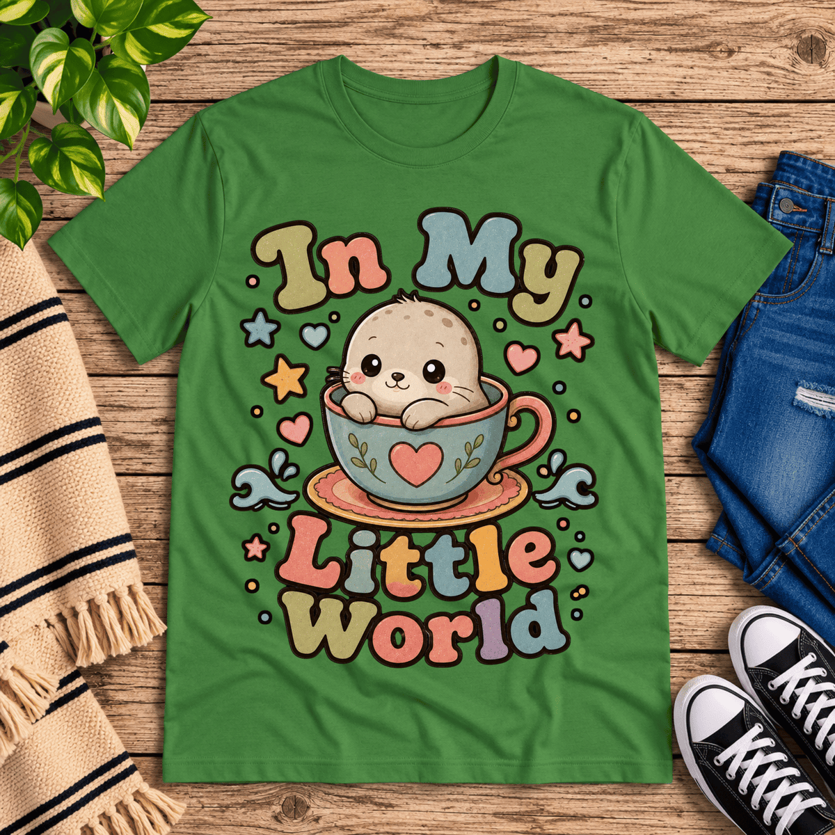 In My Little World cute animal graphic t-shirt cozy flat lay in leaf.