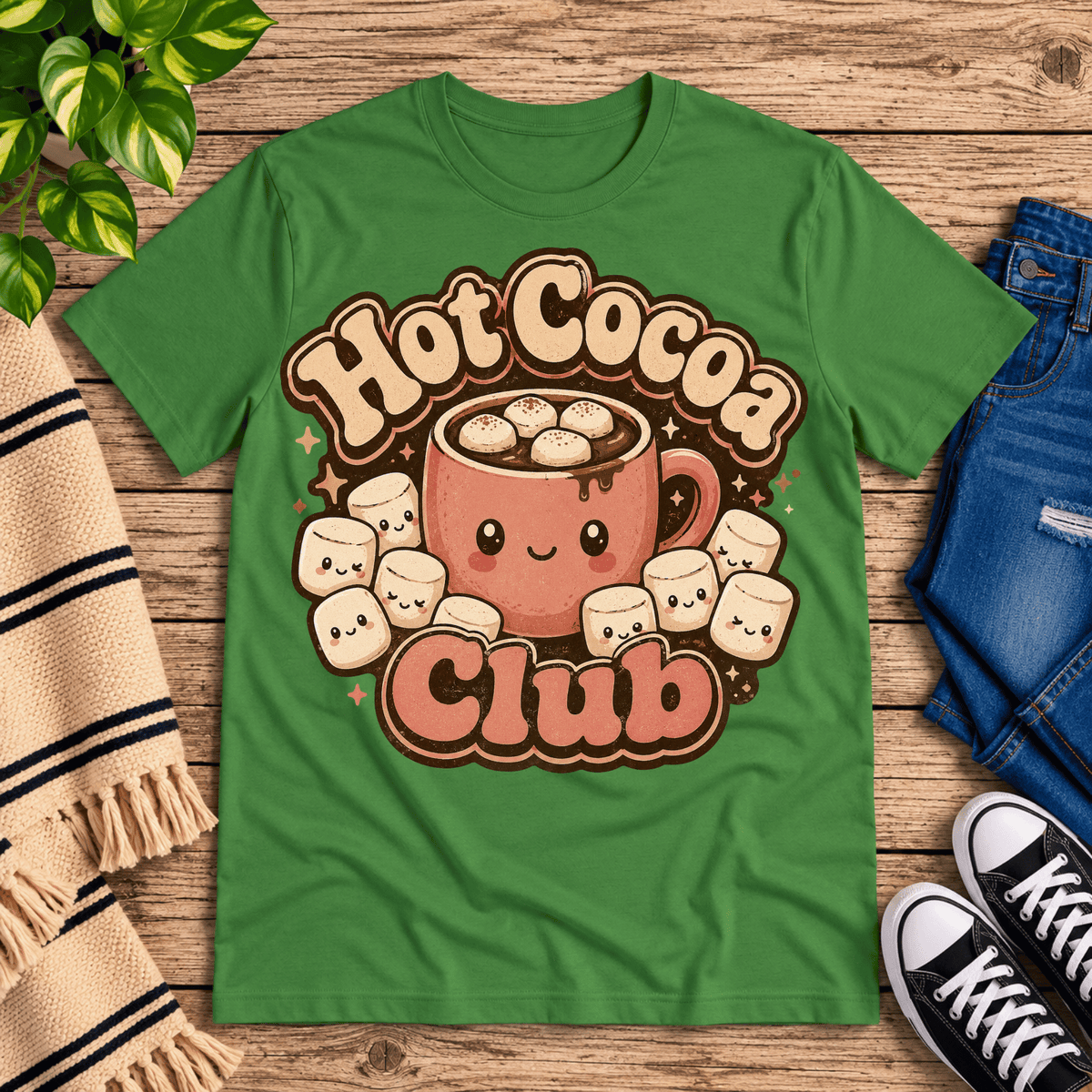 Hot Cocoa Club cute coffee graphic t-shirt cozy flat lay in leaf.