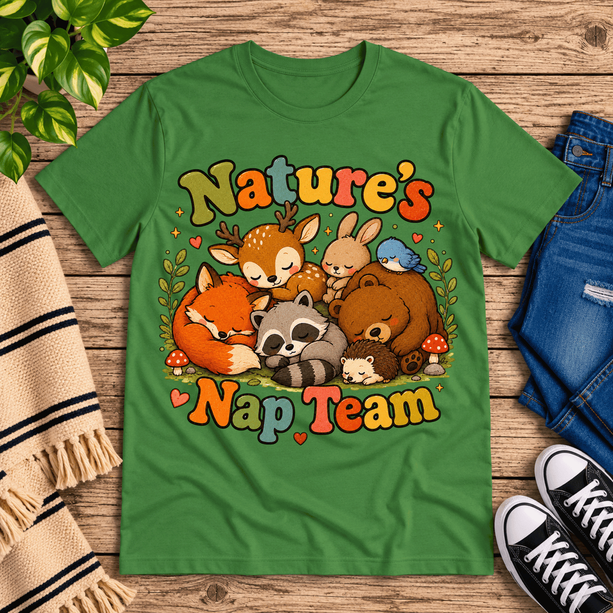 Nature's Nap Team cute animal graphic t-shirt cozy flat lay in leaf.