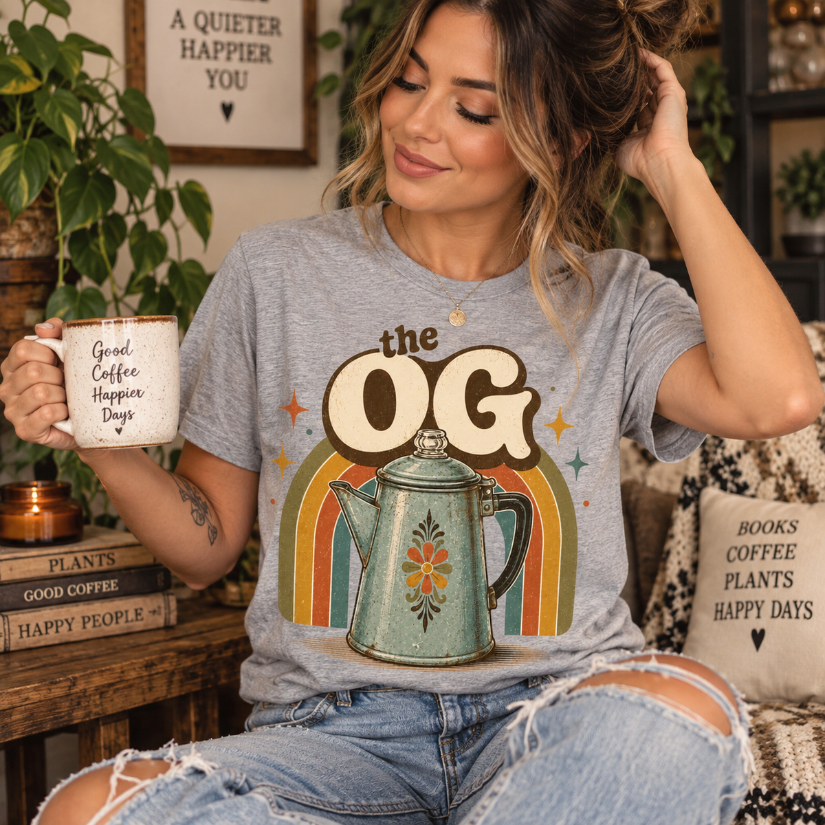 A woman wearing an athletic heather The OG retro coffee graphic t-shirt.