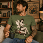 Man wearing Love Bomb graphic t-shirt in leaf sitting in a living room with a cup of coffee.