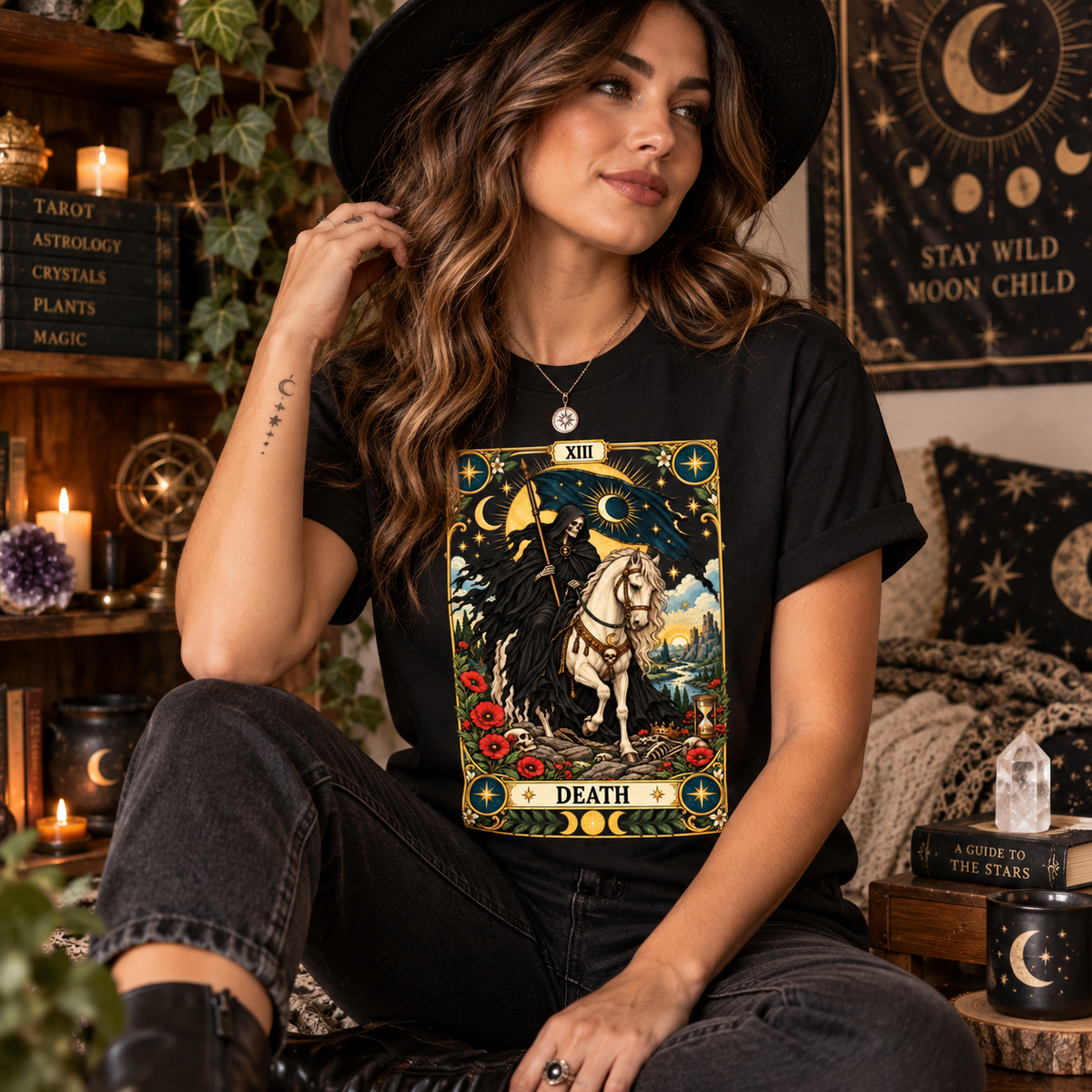 A woman wearing a vintage black Death tarot card graphic t-shirt.