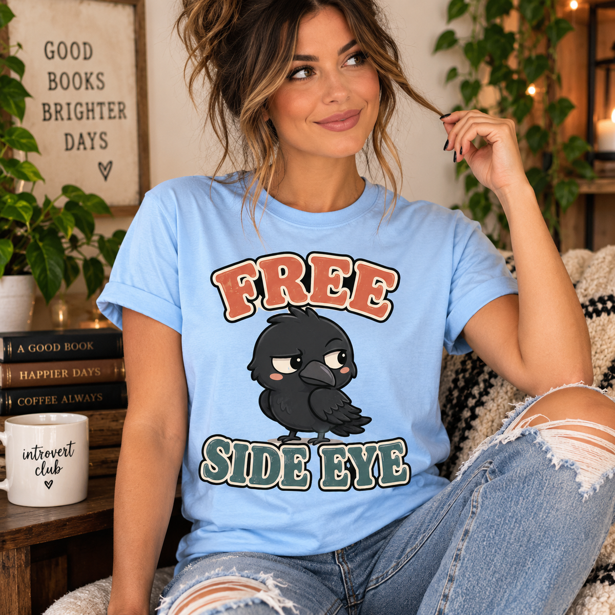 A woman wearing a baby blue Free Side Eye funny animal graphic t-shirt.