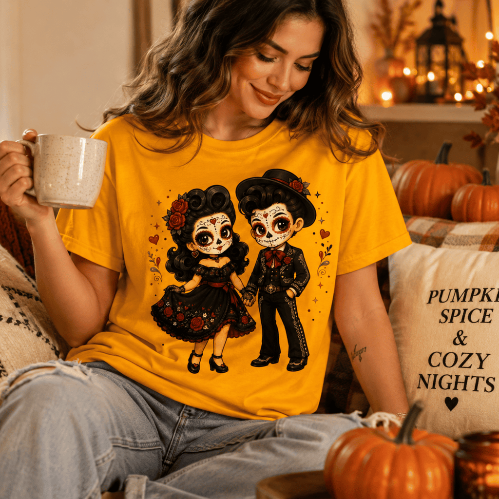 A woman wearing a gold Mr. & Mrs. halloween pinup graphic t-shirt drinking coffee.