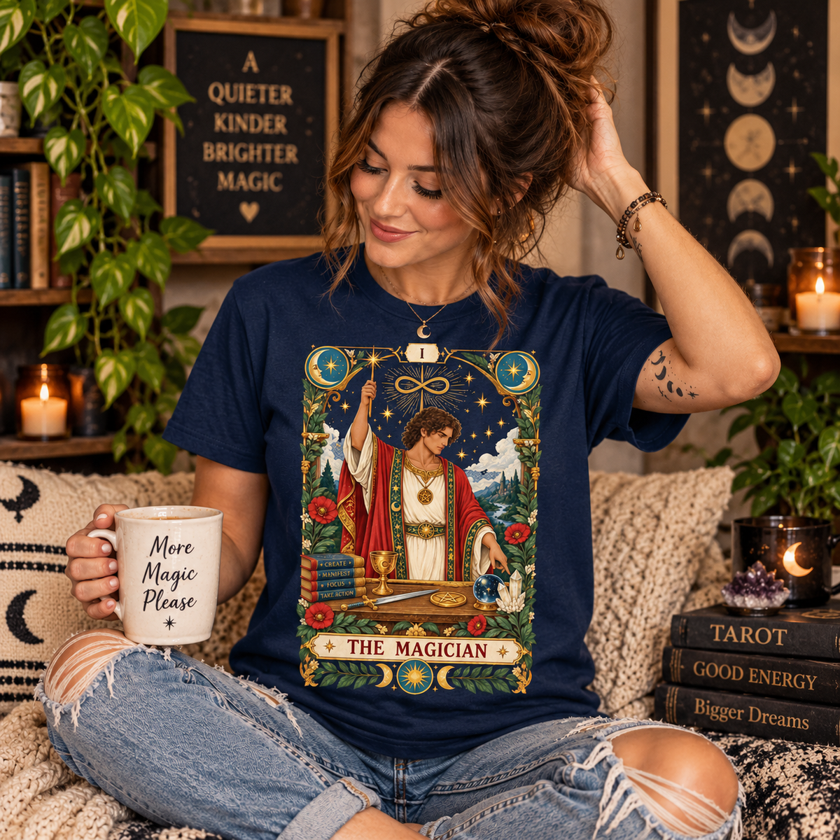 A woman wearing a navy The Magician tarot card graphic t-shirt.