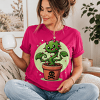 A woman wearing a charity pink Poison Ivy funny plant graphic t-shirt drinking coffee.